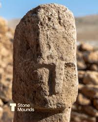 The monumental T-shaped pillars of Göbekli Tepe, featuring intricate animal reliefs.